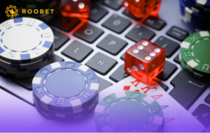 An image of playing chips, cards, and dice on a keyboard